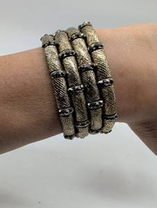 lot 674005 image: Textured Gold Tone Multi Strand Wrap Bracelet with Black Crystal Accents