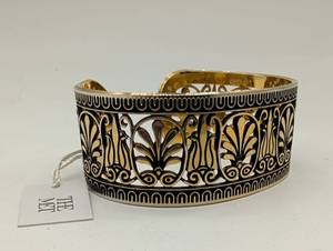 lot 674024 image: Gold and Black Decorative Cuff Bracelet with Classical Motifs
