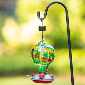 lot 70762 image: Decorative Glass Hummingbird Feeder with Red Flower Ports - Retail $35