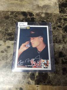 lot 1243 image: 1993 Upper Deck Collectors Choice Silver Signature Cal Ripken Jr. Baltimore Orioles Baseball Card