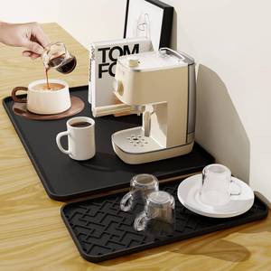 lot 36345 image: Silicone Coffee Maker Mat- Espresso coffee bar Mat accessories1912 - Convex Design, Leak-Proof and Non-Slip, Suitable for Use Under the Coffee Machine to Keep the Countertop Clean - Retail $10