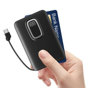 lot 36354 image: Ultra-Thin Mini Portable Charger Power Bank 5000mAh with Built-in USB-C Cable, Compact External Battery Pack for Outdoor Use, Compatible with iPhone 1615, Google Pixel, and More - Retail $10