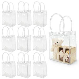 lot 8112 image: 10 PCS Clear Gift Bags with Handles(2.7x5.1x5.9 Inch) Reusable Transparent PVC Tote Goodie Bags Bulk Wedding Brthday Holiday Party Favors Supplies Wrap Basket Stuffers Goody Pouch Baggies for Presents
