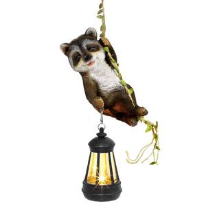 lot 6358 image: ZaaYee Solar Hanging Raccoon Statue, Outdoor Resin Animal Figurine with LED Lights for Garden, Fence, Porch, Patio, Yard Decor, Dusk to Dawn Auto OnOff