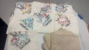 lot 1011 image: Embroidered Days of the Week Kitten Kitchen Towels Set and more