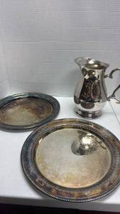 lot 1038 image: Silver plated serving trays and water pitcher