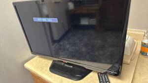 lot 1048 image: LG 24 inch Flat Screen Television with Remote Control