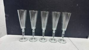 lot 1051 image: Set of 5 Champagne Flutes with Textured Pattern