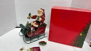 lot 1061 image: Clothtique Santa in Sleigh Christmas Figurine by Possible Dreams