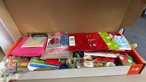 lot 1229 image: Plastic gift bags, tissue paper, Gift tags, tape and holiday sacks