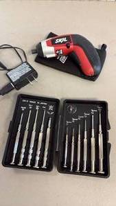 lot 1242 image: SKIL iXO 4-Volt Max Lithium-Ion cordless palm-sized screwdriver works and screw combination driver sets