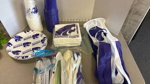 lot 1250 image: K State plates, cups, utensils and wind sock