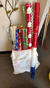 lot 1258 image: Wrapping paper with roll of redwhiteblue plastic table cover