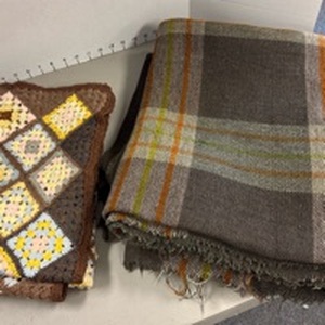lot 1315 image: Wool fabric and crochet baby blanket