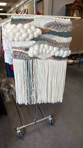 lot 1326 image: handcrafted fiber art wall hanging or tapestry featuring woven textures and fringe 30x24