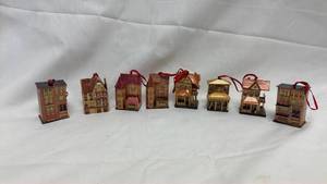lot 28 image: 8-Piece Wooden Christmas Village House Ornaments Set