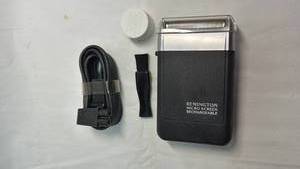 lot 46 image: Vintage Remington Micro Screen Rechargeable Shaver XLR-900 with Case. Appears in new unused condition.