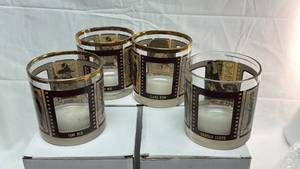 lot 49 image: Classic Hollywood Stars Film Strip Whiskey Glasses Set