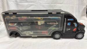lot 108 image: Semi Truck Carrier Storage Case filled with Die Cast Cars