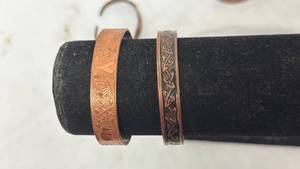 lot 128 image: 4 Copper Cuff Bracelets with Native American Style Patterns