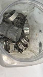 lot 224 image: Stainless Steel Hose Clamps in Plastic Storage Jar