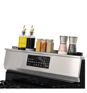 lot 269 image: StoveShelf 30 Length BLACKl Finish Magnetic Shelf for Kitchen Stove  - Retail $0