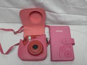 lot 275 image: Fujifilm Instax Camera in case with matching Photo Album Case Pink Leather