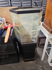 lot 58005 image: Hexagonal Glass Fish Tank with Black Stand and Decorations