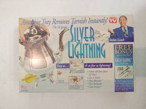 lot 58033 image: The Original Silver Lightning Kit Cleans All Your Silver Robin Leach Telebrands