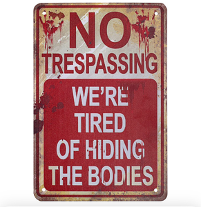lot 2406 image: Halloween Metal Signs No Trespassing Were Tired of Hiding the Bodies Metal Sign Retro Fashion Chic Funny Metal Tin Sign for Halloween Decorations - Retail $0