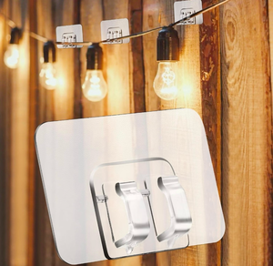 lot 2898 image: 50Pcs Outdoor String Light Hooks �� Heavy Duty Adhesive Wall Hooks for Hanging Christmas Lights, Waterproof Clear Cable Clips for Indoor & Outdoor Decor, No-Drill Wall-Safe Rope Organizers - Retail $0