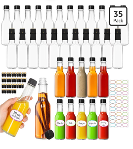 lot 3087 image: AuroTrends Hot Sauce Bottles 5 oz 35Pack, Empty Wine Bottles with CapsShrink CapsulesStickers -5oz Clear Woozy Bottle with Lids (5 fl.oz 35Pack) - Retail $0