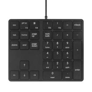 lot 12335 image: Merdia Numeric Keypads Wired Numpad 34 Keys External Mini Slim Keyboard Magic Force for Financial Cashier Securities-Black Laptop Accessories  Num Pad  Number keypad for Laptop  Work Keyboard