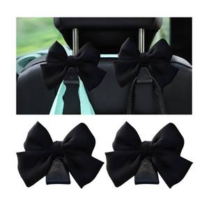 lot 12455 image: Mandark 2PCS Car Seat Headrest Hooks, Cute Bow Vehicle Hooks for Purses and Bags, Automotive Purse Hook Hanger Interior Decoration Accessories, Universal for SUV, Sedan, Truck (Black Line)