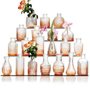 lot 13538 image: Glass Bud Vase Set of 20 - Small Vases for Flowers in Bulk - Assorted Vintage Crystal Vases for Flowers, Table Centerpieces (Amber, 20 Pcs)