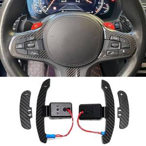 lot 4387 image: Magnetic Steering Wheel Paddle Shifter for BMW M2 M3 M4 G87 G20 G30 G80 G82 G01 G05 G07 F15 F80 F82 F87 F30 Z4 G29 F30 G22 X3 X5 X6 X7 M All Models Carbon Fiber Paddle Extension for Toyota Supra 18