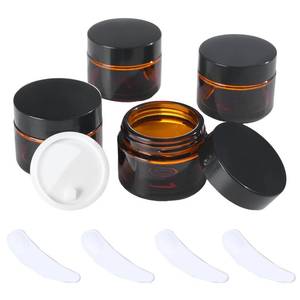 lot 12353 image: OverNews 2oz Amber Glass Jar Travel Size, 4PCS Empty Cosmetic Lotion Container with Black Lid & Spatula, Small Mini Jar for Beauty