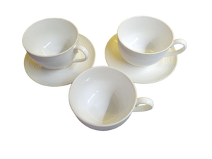 lot 15648 image: White Porcelain Tea Cups and Saucers with Ribbed Pattern 3 Cups 2 Plates