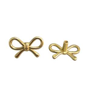 lot 4097 image: YEMCHI 2 Pack Solid Brass Bow Drawer Knobs, Gold Bow Knobs for Kitchen Cabinet Hardware, Vintage Vanity Dresser Pulls, Nursery Kids Bedroom Creative Tie Decorative Handles (Brass Bow)