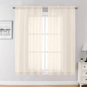 lot 18318 image: Chyhomenyc Cream Sheer Curtains 63 Inches Long 2 Panels Set- Light Filtering Curtains for Bedroom, Soft Airy Voile Rod Pocket Living Room Window Drapes, 42Wx63L Inches, 2 PCS
