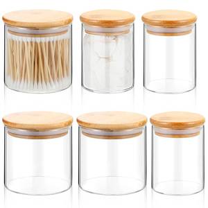 lot 14204 image: Dandat 6 Pack Glass Apothecary Jars with Lids Bamboo Bathroom Jars Cotton Ball Pad Round Swab Holder Dispenser Vanity Canisters for Countertop Storage Hair Ties Floss Organizer, 8.5 oz and 10.8 oz