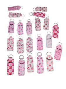 lot 6122 image: Pink Cherry Pattern Hand Sanitizer Holder Keychains Set of 21