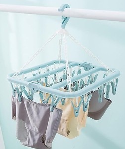 lot 12427 image: Light Blue Clothes Hanging  Set (Missing Hook)