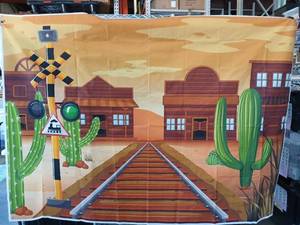 lot 10015 image: Western Train Scene Backdrop and Party Decoration Bundle