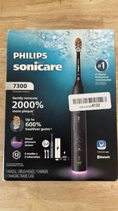lot 16263 image: Philips Sonicare 7300 Series Electric Toothbrush - Next-Generation Sonicare Technology, Pressure Sensor, 12 Brushing Settings, SmarTimer, BrushPacer, 21-Day Runtime, Travel Case, Black, HX742107