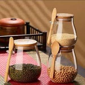 lot 3461 image: DNIENKGE Airtight glass jar storage container with bamboo lid Set of 4, wide mouth, leak-proof, With a spoon, can be used for coffee beans, tea leaves, grains, dried fruits, etc (Middle4pcs)