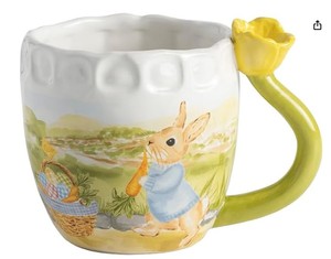 lot 6316 image: Mud Pie Stoneware Easter Bunny Mug with Figural Yellow Tulip Handle