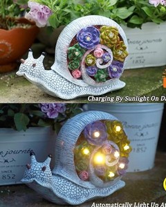 lot 12280 image: FORUP Snail Garden Statue, Resin Snail Figurine Garden Lawn Ornaments with Solar LED Lights for Outdoor Yard Garden Decorations