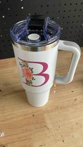lot 19868 image: Stainless Steel Travel Tumbler with Floral B Design (cosmetic damage)