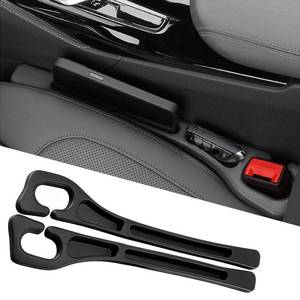 lot 45812 image: Car Seat Gap Filler 2-Pack, Universal Car Seat Gap Filler Organizer, Seat Gap Plug Fills Gap Between Seat & Console, Drop-Proof Guard for Phones, Keys & Cards, Fits Cars, SUVs, Trucks, Black - Retail $9